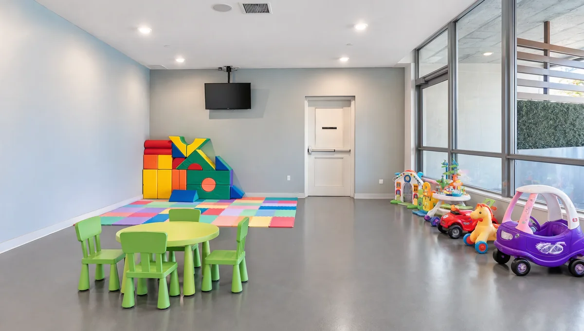 Kids Playroom with toys and small tables